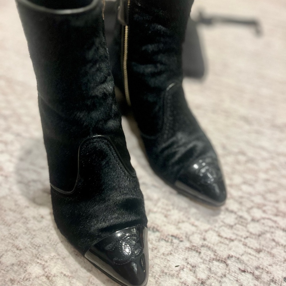 CHANEL Black Heeled Boots with Sleek Silhouette